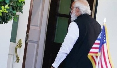 Modi enters The Oval.